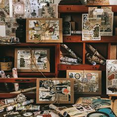 there are many different items on the shelves in this room, including books and pictures