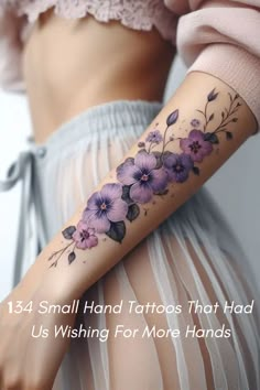 a woman's arm with purple flowers on it and the words, 13 small hand tattoos that had us wishing for more hands