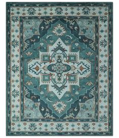 a blue rug with an ornate design on the center and sides, in various colors