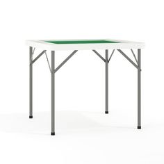 a white table with a green top and metal legs on an isolated background, viewed from the side