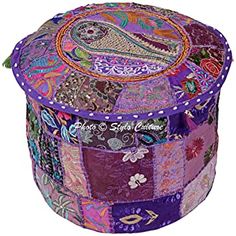 a round patchwork box with decorative designs on it