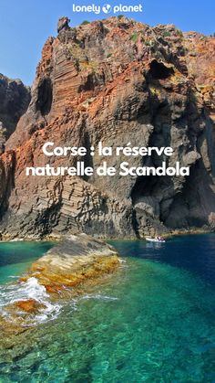 an image of the ocean and mountains with text that reads corse la reserve naturale de