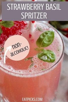 strawberry basil spritzer in a glass with strawberries on the rim and text overlay