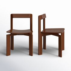 two wooden chairs sitting next to each other on a white surface with one chair facing the other