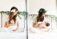 a woman holding a baby in her arms while sitting on a bed with greenery