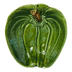 a large green pepper is shown on a white background with clippings to the side