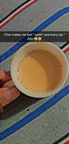 someone is holding a cup of coffee with the caption that reads, chai makes me feel'wash'and every sip