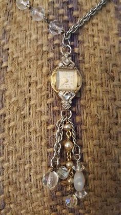 This is what I need to do with those heirloom watches with the broken bands... turn them into charms. Old Watch Necklaces, Upcycled Watch Jewelry, Watch Jewelry Ideas, What To Do With Old Watches, Vintage Watch Necklace, Repurposed Watches, Watch Bracelets, Jewelry Repurposed