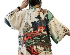 Gorgeous kimono jacket, designed with a lightweight fabric, it flows as you move for a comfortable wear. It has inspired by Japanese artist Yashima Gakutei (Edo period 1615-1868)'s woodblock print, Goddess Benten and Dragon Surimono. It features a fantastic image of the goddess Benten dressed in beautiful Chinese style robe, playing a single stringed zither. A jade dragon curls around the tree listen to her play. The calligraphy above shows poetic greeting.   It is finished with an open front an Jañanese Kimono, Kimono Streetwear, Traditional Luxury Multicolor Kimono, Cotton Samurai Kimono With Long Sleeves, Unique Japanese Kimono, Printed Kimono Jacket, Festival Tie-dye Kimono With Kimono Sleeves, Belt Kimono, Printed Kimono