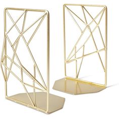 two gold geometric bookends on white background