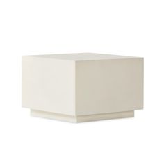 a white square object sitting on top of a table