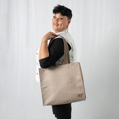 One of our most popular products, this shopper is perfect for almost anywhere you can imagine. This fabric is as robust as it gets. The bag is handcrafted from the excess material reclaimed from a high-end outdoor furniture company. Our customers love it for:- a work tote- a beach bag- a market tote- a mom bag (all the snacks and toys!)- a project bag- a library bag You can't go wrong! The bag features durable double straps that are the perfect length to tuck this bag right under your armBoth st Mom Bag, Library Bag, Mom Bags, Grocery Items, Work Tote, Popular Products, Project Bag, Market Tote, Shopper Tote