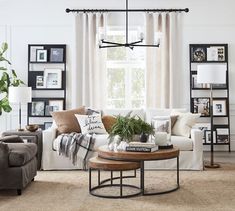 a living room filled with furniture and decor