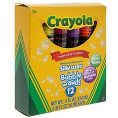 a box of crayola glues with different colors and sizes on the inside