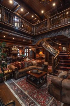 a living room filled with lots of furniture and a spiral staircase in the middle of it