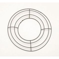 three metal circles on a white background