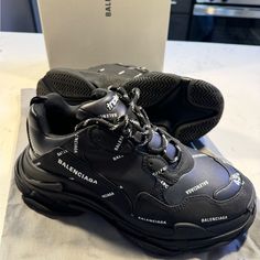 New Condition! Box Included! Only Worn Once** Size 43 Mens Equivalent To A Size Us 10 Mens Leather Free Sneaker Technical Material Printed Balenciaga Allover Logo Complex 3-Layered Outsole Embroidered Size At The Edge Of The Toe Embroidered Logo On The Side Embossed Logo In The Back Triple S Rubber Branding On The Tongue 2 Laces Loops Including 1 Functional Lacing System Featuring 12 Fabric Eyelets Bicolor Laces Recalling Hiking Boots’ Laces 1 Additional Pair Of Laces Back And Tongue Pull-On Tab Shoes Balenciaga, Balenciaga Triple S, Mens Leather, Lace Back, Embossed Logo, The Edge, Mens Shoes Sneakers, Leather Men, Hiking Boots