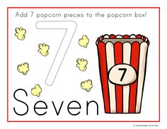 the number seven is in front of a box of popcorn and it's numbers seven