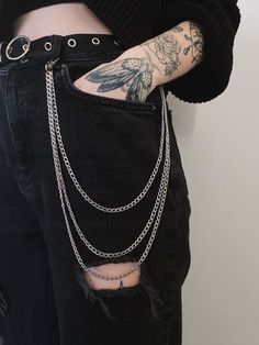 Three draped cuban chains with clips at each end. Can be worn as a wallet chain, necklace, trouser chain, jean chain, wrapped bracelet and more. The inner chain is approximately 40cm from end to end. All parts of this item are made from thick solid stainless steel. Stainless steel is corrosion resistant and extremely hardwearing, making this accessory perfect for every-day wear. As this item is handmade there may be slight variations in appearance. Every effort is made to ensure the pictures are representative of the items, however lighting and screen quality may distort the appearance of the pieces. ✨ Find a wider product range, cheaper shipping and additional discounts at www.badtimesdesigns.com (UK shipping only)✨ Mens Fashion Chains, Edgy Outfits Grunge, Trouser Chain, Jeans With Chains, Jeans Chain, Cuban Chains, Silver Pants, Grunge Clothes, Pant Chains