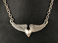 Winged Love Heart Sterling Silver 925 Biker Motorcycle Necklace Made in Mexico Type: Necklace Stone: n/a Necklace Length: 17.5" Chain Width: 4.2 mm Height: n/a Weight: 23.4 gr Clasp: Toggle Signed: 925 Mexico MM34 Condition: Light scratch and patina to the sterling, easy to polish up, the clasp is secure Comments: This is a beautiful necklace, very well made, feminine and durable Please see all photos for details Motorcycle Necklace, Mexico Art, Necklace Stone, Beautiful Necklace, Necklace Length, Stone Necklace, Sterling Silber, Silver Necklaces, Silver 925