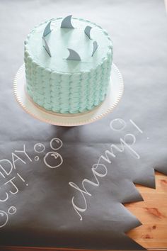 a birthday cake is sitting on a table