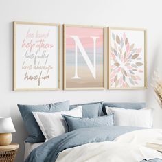 a bedroom with two framed pictures above the bed