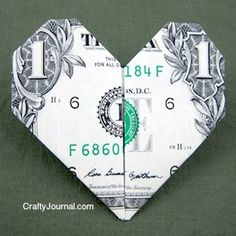 dollar bill folded in the shape of a heart with words that read, i love you dollars