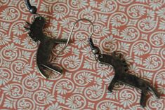 Antique brass tribal horse charms on antique brass French ear wires. Please see Shop Policies for additional shipping information. Horse Earrings, Rancho Cucamonga, May 20, Shop Policies, Ear Wires, Antique Brass, Beauty Book, Jewelry Earrings, Charms