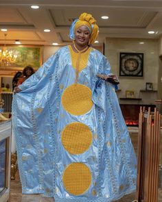 Description: This magnificent custom African dress is perfect for any occasion you want to look your best. It includes 3 pieces (Full dress, wrap-around or Skirt and head-tie).   Important Note: For broderie mix with bazin and garniture mix clothes only: Depending on the availability of the( fabric) / Garnitures (TRIMS) may be different than the one in the pictured. However, the dress will be sewn exactly in the style and colors shown. You can always request to see the fabrics or trims before we Gold Long Sleeve Dress For Fancy Occasion, Gold Long Sleeve Fancy Dress, Yellow Dress Outfit Summer, Traditional African Dresses For Women, Gold African Dress, Yellow Dress Outfit, Head Tie, African Fashion Skirts, Dress African