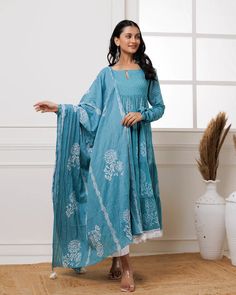 Beat the heat with effortless style in our Light Blue Hand Block Printed Anarkali Set. Made with the finest mul-mul fabric, this suit set is perfect for making a fashion statement even in soaring temperatures. Stay cool and chic even in heat. No. of pieces - 3 piece set. Color - Light Blue. Fabric - Mul-Mul. Washing Instructions - Dry Clean. Diwali Blue Cotton Silk Anarkali Set, Indigo Kurta With Dupatta For Eid, Eid Indigo Kurta With Dupatta, Eid Special Indigo Kurta With Dupatta, Blue Unstitched Palazzo Set For Transitional Season, Blue Anarkali Palazzo Set In Cotton Silk, Indigo Anarkali Traditional Wear With Dupatta, Blue Anarkali Style Cotton Silk Palazzo Set, Festive Indigo Anarkali Set With Dupatta