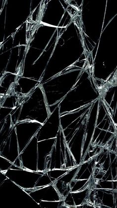 shattered glass on a black background with no image in the frame to describe what it looks like