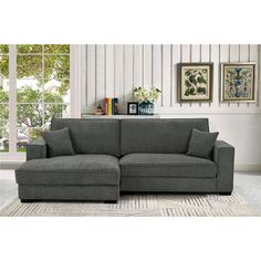 a living room scene with focus on the sectional sofa