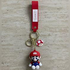 a keychain with a nintendo character on it