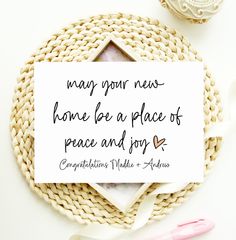 there is a sign that says may your news home be a place of peace and joy