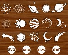 the sun, planets and stars are cut out from paper on a wooden surface with space symbols