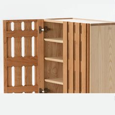 a wooden cabinet with open doors and shelves