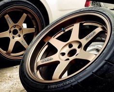 two tires sitting next to each other on the ground