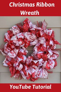 a red and white christmas wreath with the words, christmas ribbon wreath you tube tutor