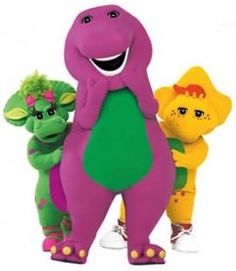 three stuffed animals are standing next to each other in front of a white background and one is wearing a purple dinosaur costume