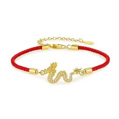 PRICES MAY VARY. **🌟 Elegant Design**: Elevate your style with our stunning "AMINKINA JEWELRY" Original Auspicious Dragon Red Rope Bracelet. This intricately designed bracelet features a divine dragon motif, symbolizing luck, prosperity, and protection, making it the perfect accessory for any occasion. **💎 Premium Quality Material**: Crafted from high-quality 14k gold, this bracelet exudes luxury and durability. The addition of the auspicious dragon design and the red rope adds a touch of elegance and cultural significance to the piece, making it a valuable addition to your jewelry collection. 😊 Perfect Size for All**: With a chain length of 15.5+4cm and weighing 2.83g, this bracelet offers the perfect fit for any wrist size. Whether worn alone or layered with other bracelets, it provid Divine Dragon, Chinese Zodiac Dragon, Dragon Motif, Lucky Dragon, Dragon Year, Dragon Bracelet, Red String Bracelet, Red Rope, Gold Dragon