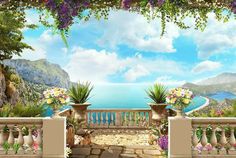 an outdoor area with flowers and plants on the balcony overlooking the ocean, birds flying in the sky