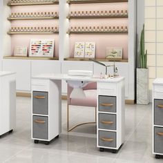 an office with two desks and three drawers