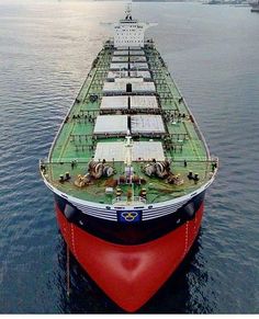 a large boat floating on top of a body of water