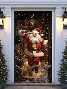 a door decorated with christmas decorations and santa clause