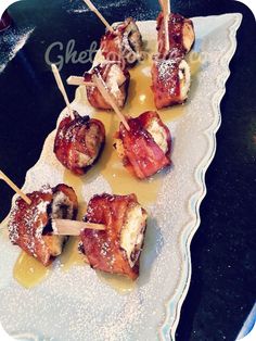 bacon wrapped in powdered sugar and skewered with toothpicks