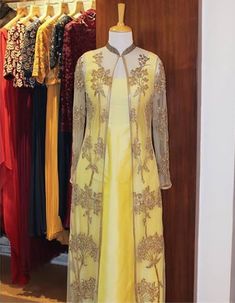 Jacket with embroidery. Kurthi Overcoats, Net Overcoat Kurtis, Overcoat Dress Women Indian, Long Jacket Style Suits For Women Indian, Kurti With Overcoat, Net Jacket Style Kurti Long, Net Coat Model Kurtis, Net Jacket Dress, Overcoat Kurti Design Long