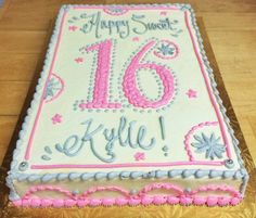 a birthday cake with the number sixteen on it