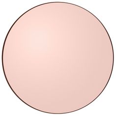 a round object that is pink and has brown lines on the bottom half of it