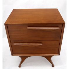 a wooden cabinet with two drawers on one side and an open drawer on the other