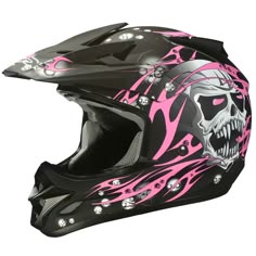 a helmet with pink flames and skulls on it